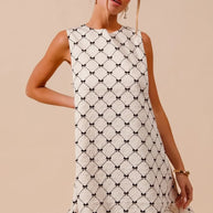 SO ME Texture Bow Printed Mini Ruffle Dress-Dresses-Trendsi-[option4]-[option5]-[option6]-[option7]-[option8]-Shop-Boutique-Clothing-for-Women-Online