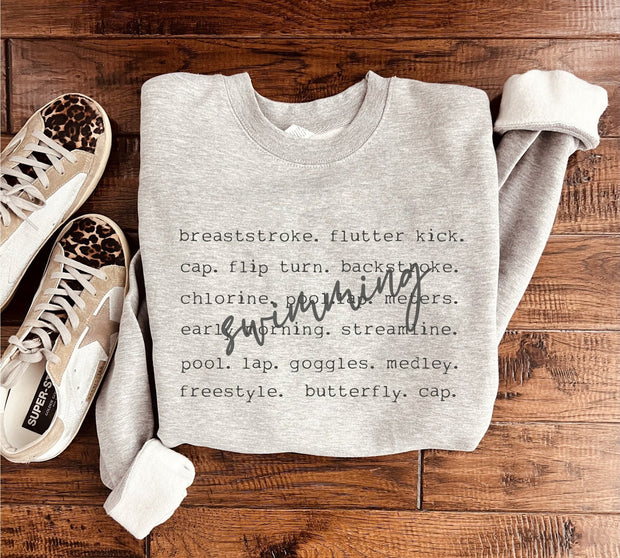 Swimming Words Sweatshirt in Two Colors-Womens-Ave Shops-[option4]-[option5]-[option6]-[option7]-[option8]-Shop-Boutique-Clothing-for-Women-Online